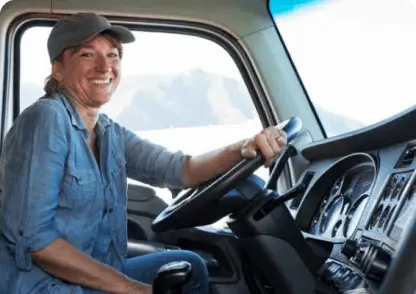 Driver smiling in the front seat